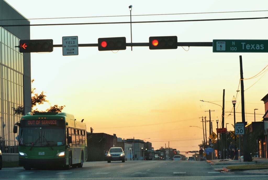 Car crash debris scattered across a road shows evidence investigated by College Station Car Accident Lawyers.