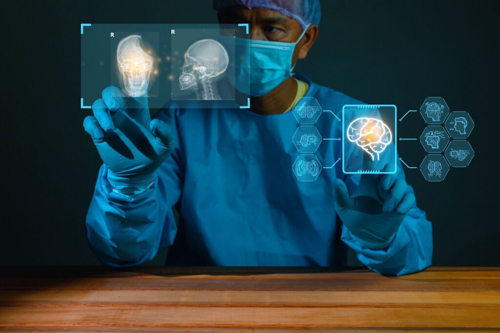 Medical professional reviewing digital head X-rays while documenting a Texas brain injury claim.