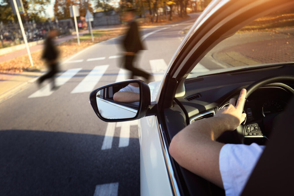 iew from inside a car of pedestrians crossing, asking if a pedestrian can be found at fault in a Texas car accident.