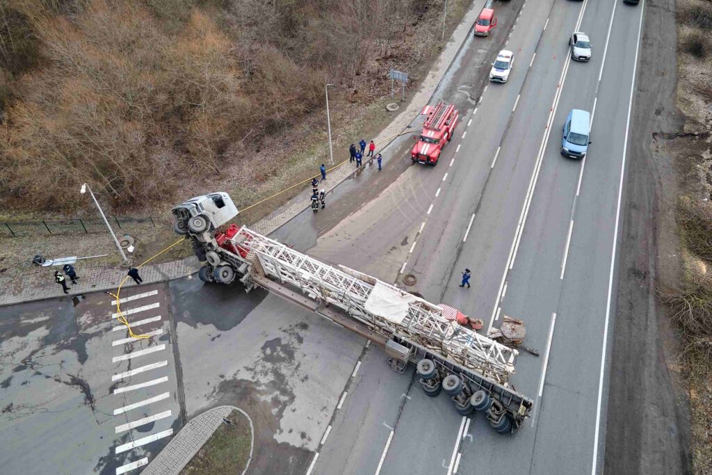 Aerial view of an overturned crane truck blocking an intersection near San Antonio.