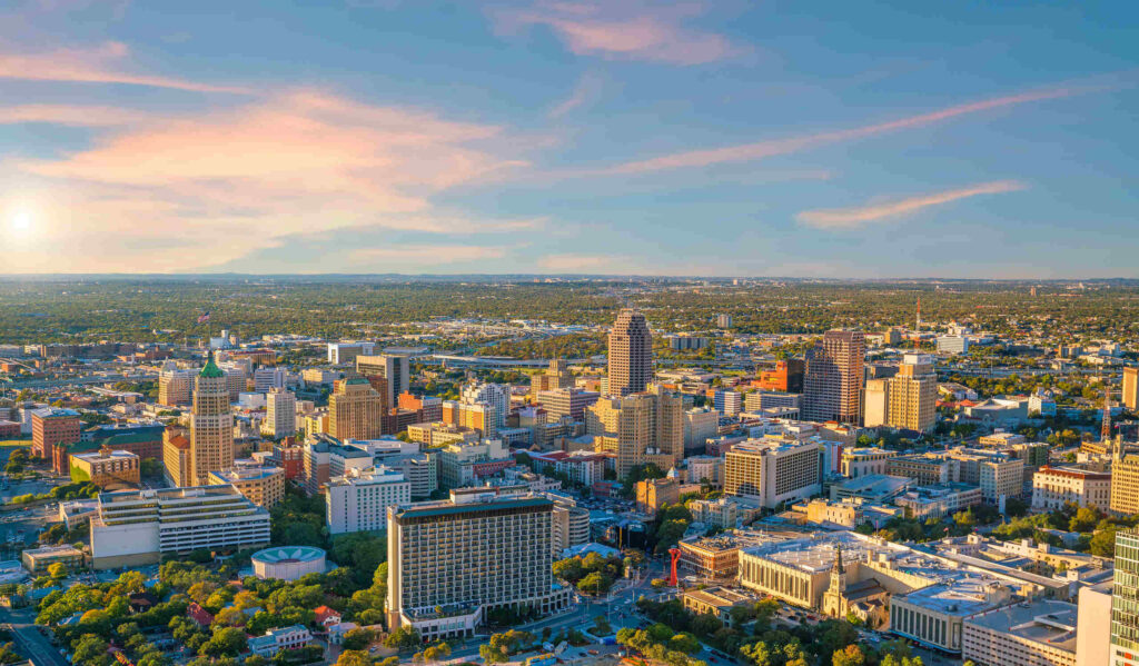 An aerial view of a sprawling Texas city landscape illustrates the wide region served by Texas Bicycle Accident Lawyers.